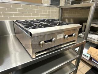 Stratus AEHP-4-24 countertop gas range, 24", 4 burners, stainless, great condition, tested and working, label visible.
