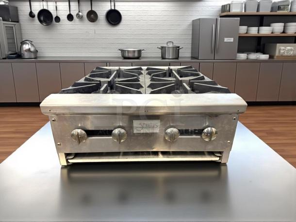 Stratus AEHP-4-24 countertop 4-burner gas range, 24", great condition, stainless steel with control knobs, tested and working.