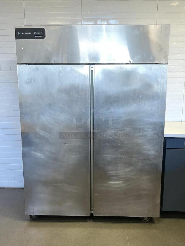 Delfield GBR2P-S refrigerator, 55 1/5" two-section, stainless steel, left/right hinge doors, 115v, tested, working condition.