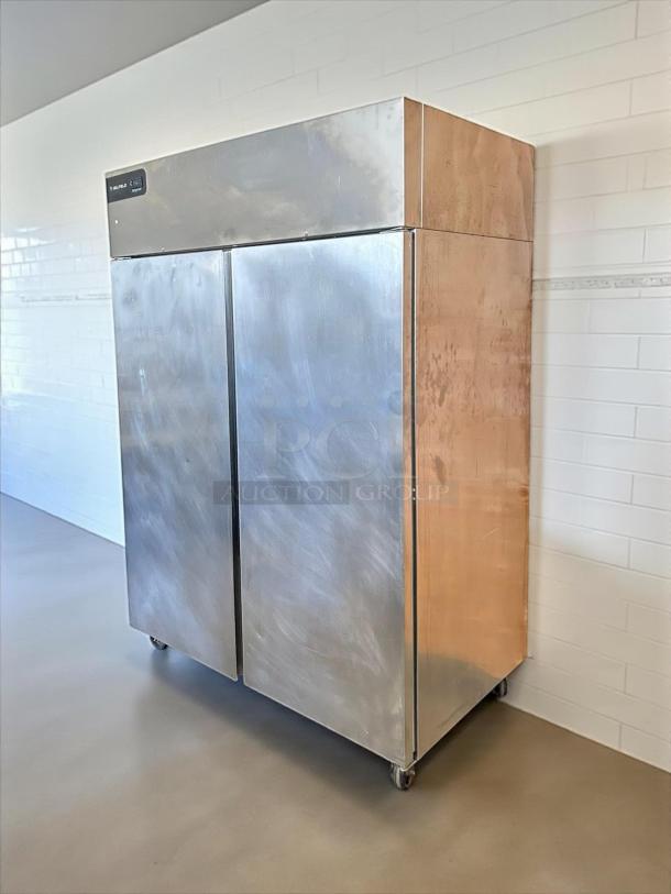Delfield GBR2P-S 55" reach-in refrigerator, two solid doors, stainless steel, excellent condition, 115v, tested working.