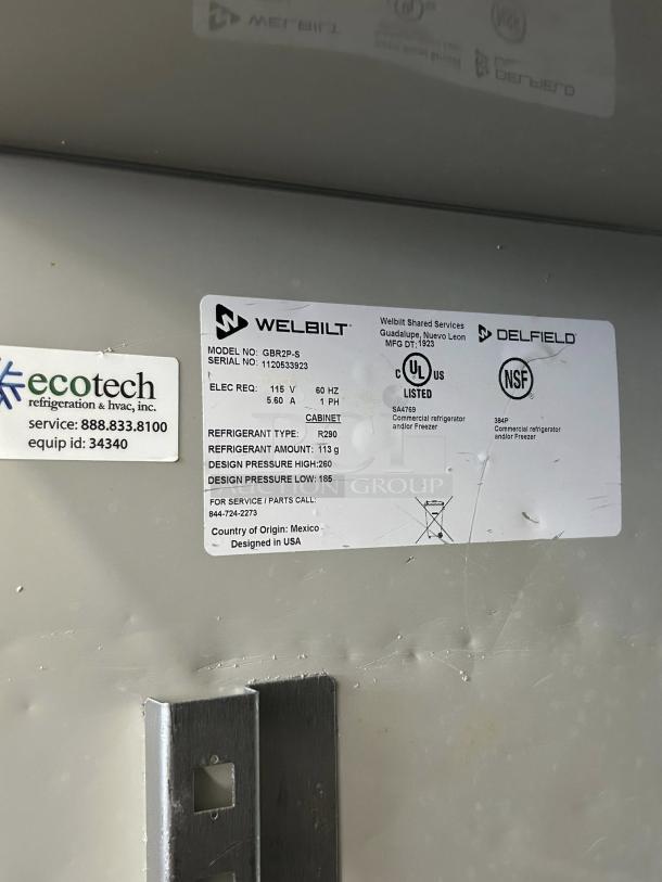 Delfield GBR2P-S refrigerator label, showing model, serial number 1120633923, 115v power, R290 refrigerant details.
