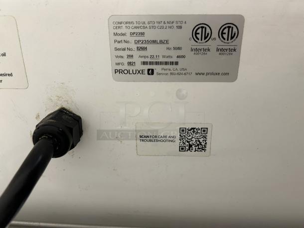 Proluxe DP2350S Apex Pro X2 pizza dough press label; model and specifications, serial no. 82604, 208V, 22.11A, 4600W, tested.