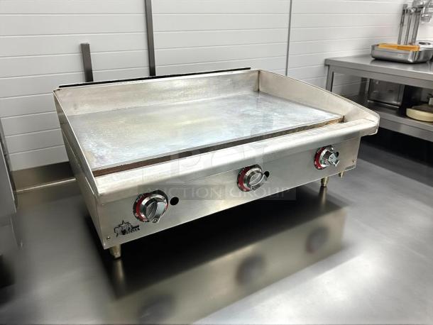 Star 636TF 36" gas griddle with thermostatic controls, 1" steel plate, in great condition, tested and working.
