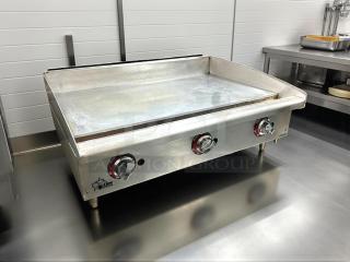 Star 636TF 36" gas griddle with thermostatic controls, 1" steel plate, in great condition, tested and working.