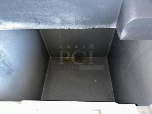 Scotsman CME1056AS ice bin interior, showing clean condition with minor wear, suitable for 420lb ice storage.