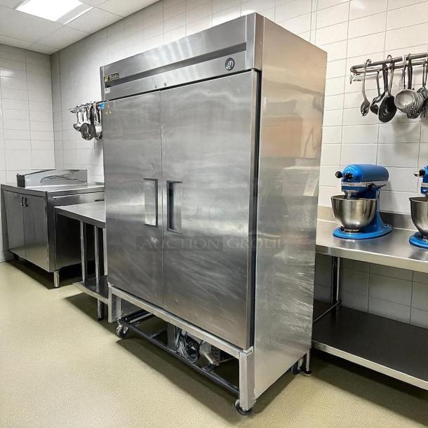 True TS-49-HC stainless reach-in refrigerator, 49 Cu.Ft, two-section, tested, working condition, 115v, polished finish.