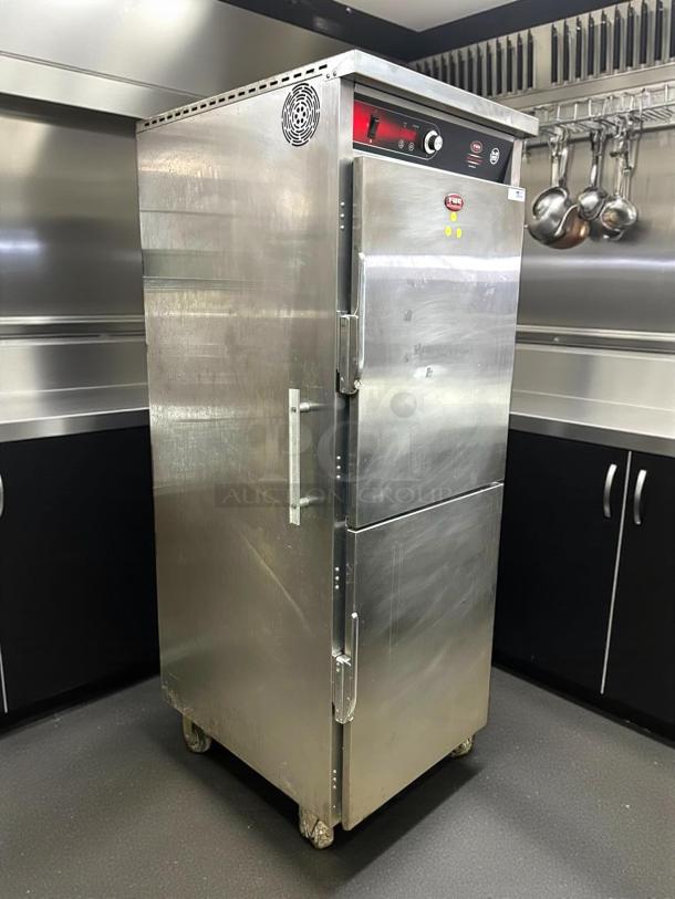 FWE UHST-13 heated holding cabinet, solid door, 13 pan capacity, stainless steel, 120V, model UHST-13, good condition.