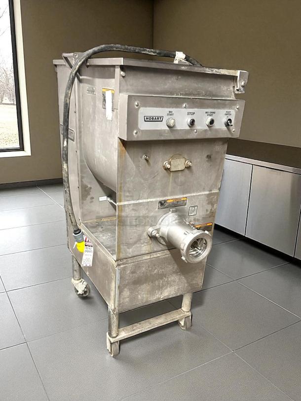 Hobart 4246-2 #32 Meat Grinder/Mixer, 208v, 3ph, 7.5 hp, stainless steel, tested working condition, with control panel and casters.