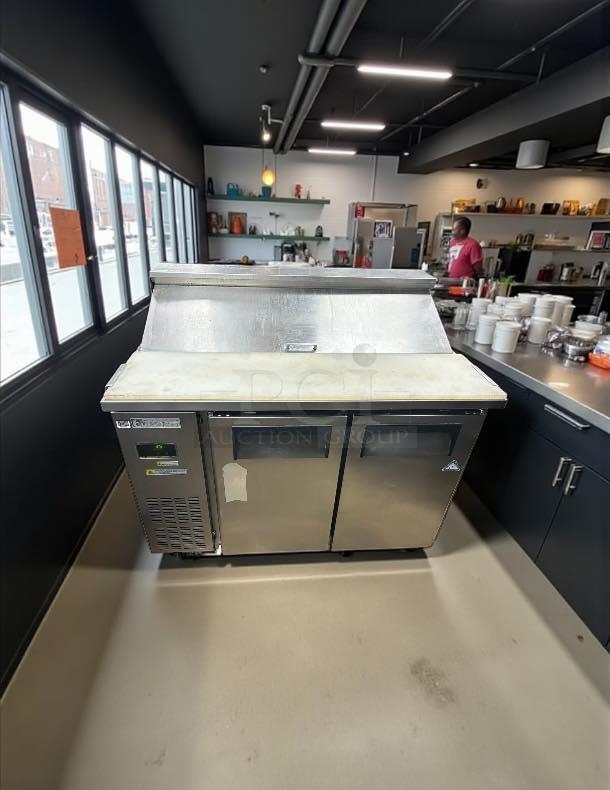 Everest EPR2-24 stainless steel sandwich prep table with two solid doors. In great condition, tested and working.