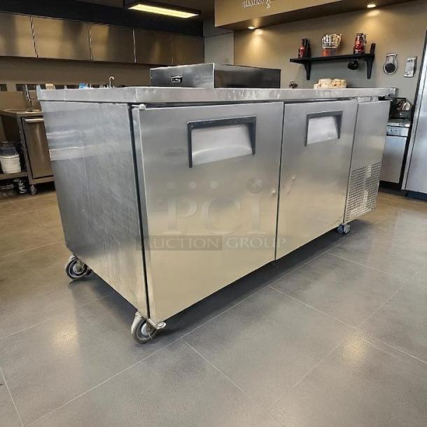 True TWT-67-HC 67" Worktop Refrigerator, stainless steel, 2 sections, on wheels, great condition, tested and working.