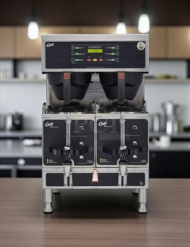 Curtis GEMTS10A1000 Automatic Twin Coffee Brewer with two lower warmers and hot water faucet. Tested, 220v/1ph. Excellent condition.