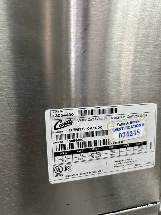 Curtis GEMTS10A1000 Automatic Twin Coffee Brewer, stainless steel, model label visible, 220v, tested and working.