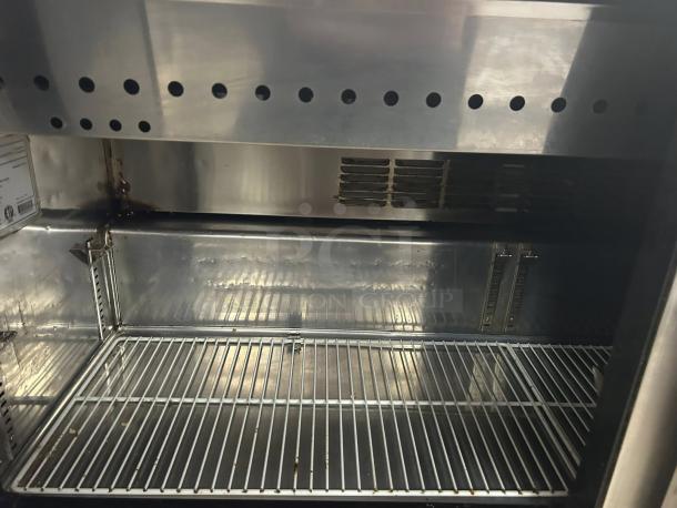 Everest Refrigeration EPBWR2 Mega Top prep table interior, showing stainless steel shelving and vent. Tested and working condition.