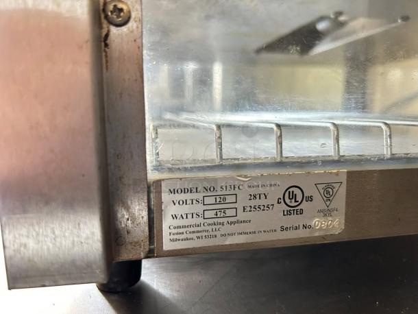 Tomlinson Industries 513FC pizza merchandiser label, showing model, 120v, 475 watts, UL listed. Stainless steel detail.