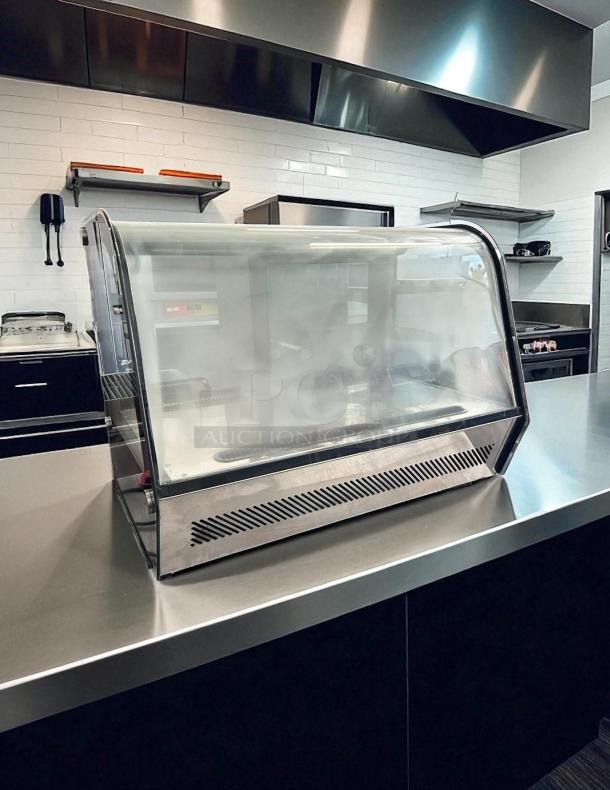 Cooler Depot RTW-160L-4 refrigerated bakery display case with LED lighting. Good condition, tested and working.