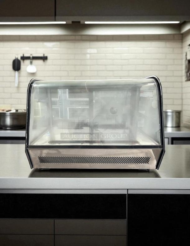 Cooler Depot RTW-160L-4 35″ countertop refrigerated bakery display case, good condition, with LED lighting.