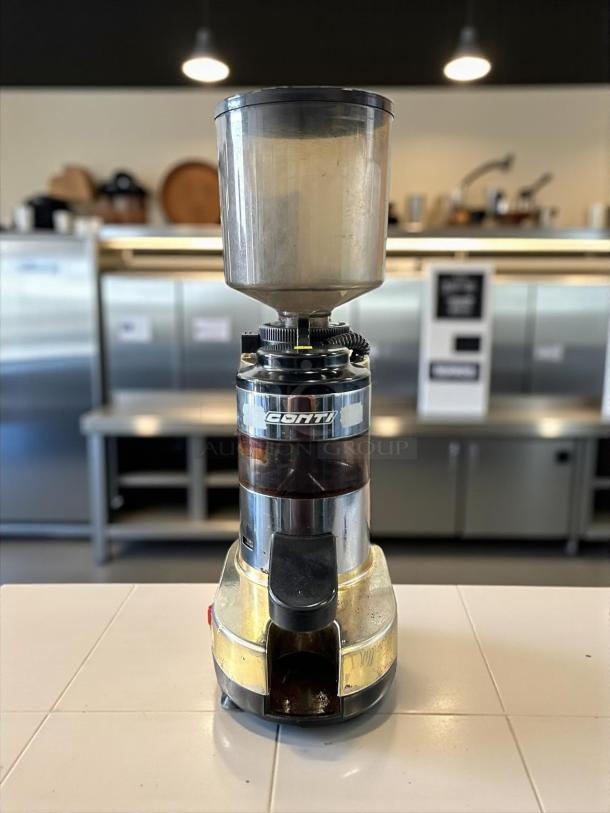 Gino Rossi RR45 Commercial Coffee Grinder, tested, fully automatic, 115v, great condition, chrome finish, visible Conti label.