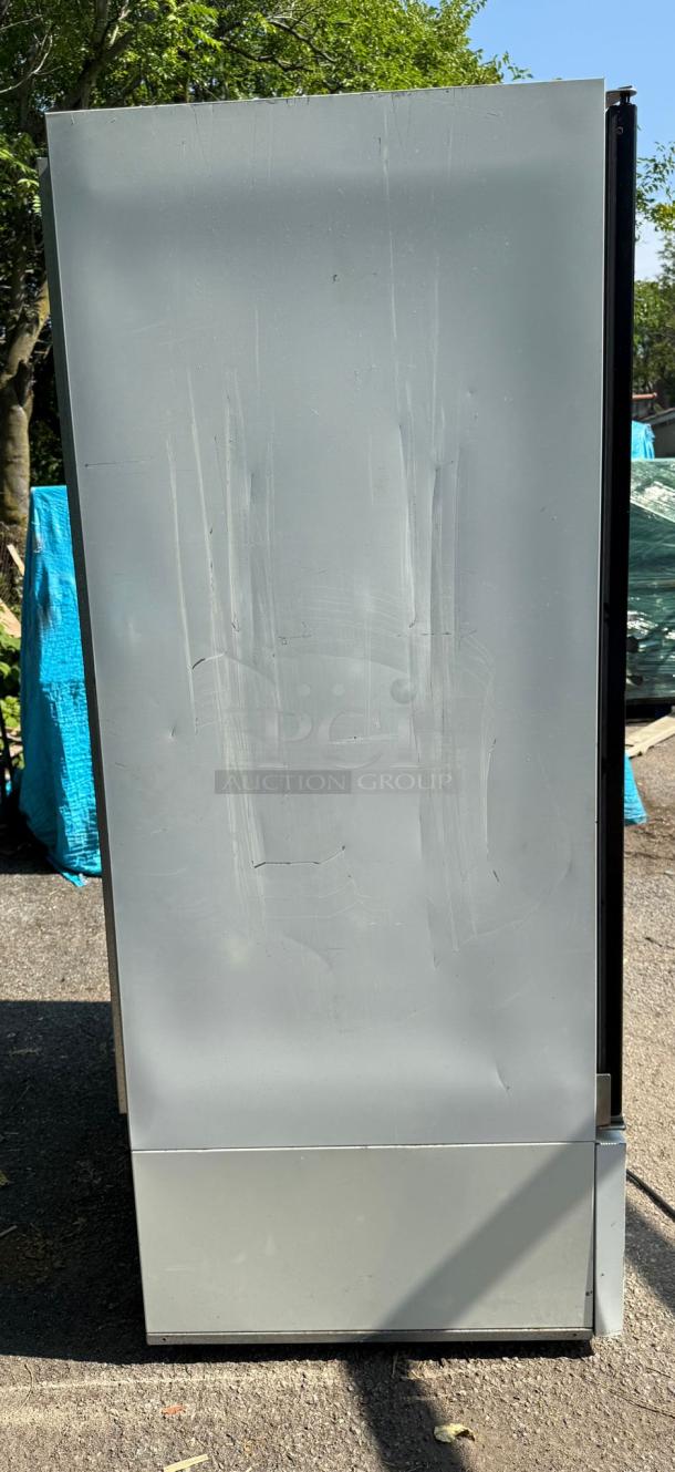 Master-Bilt BLG-48HD 2 Door Glass Freezer Merchandiser, gray exterior, visible scratches, ideal for commercial use.