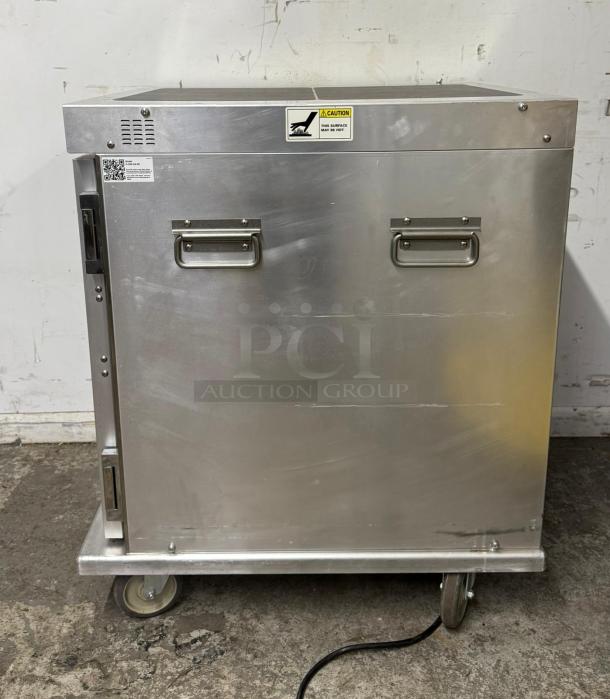 Cres Cor H339U8AC insulated mobile heated cabinet, stainless steel, 8 pan capacity, 120v, on casters, caution label visible.