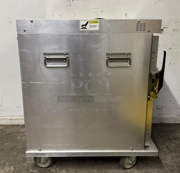 Cres Cor H339U8AC insulated heated cabinet, 8-pan capacity, stainless steel, caster wheels, used condition, 120v, caution label.