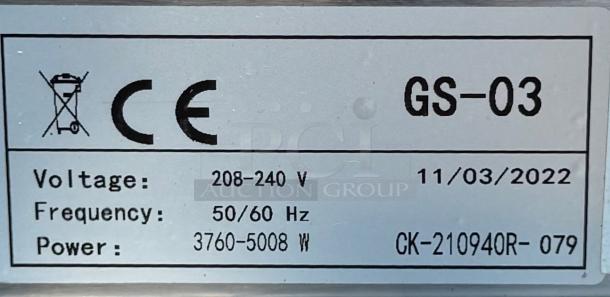 Label on Prepline Double Burner GS-03, indicating model GS-03, voltage 208-240V, frequency 50/60Hz, power 3760-5008W, dated 11/03/2022.