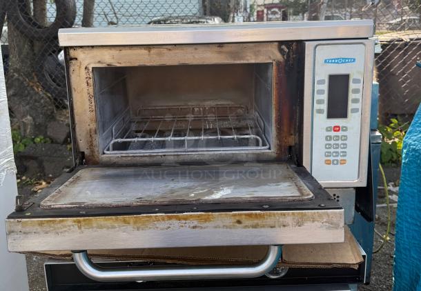 TurboChef NGC countertop rapid cook oven, visible wear, one-touch controls, 208/240V, 1 phase, open door, control panel.