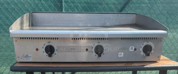 Toastmaster 36" gas griddle with thermostatic control, stainless steel, used condition, visible dials and Pro-Series label.