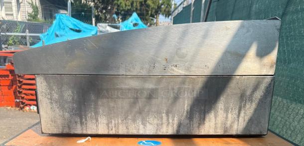 Toastmaster 36" gas griddle with thermostatic control, used condition, stainless steel surface showing wear.