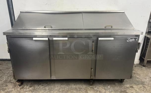 Leader commercial undercounter 3-door refrigerator lowboy fridge. Stainless steel, used condition, front view.