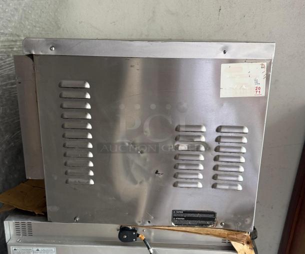 TurboChef NGC Tornado ventless oven, stainless steel, one-touch controls, 208/240V, minor wear, caution labels visible.