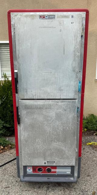 Metro C539-HDS-U full height insulated mobile heated cabinet, 17 pan capacity, visible wear, red trim, model markings.
