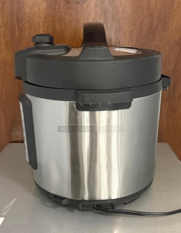 Insignia 3 Quart Pressure Cooker, stainless steel, multi-function with slow cook, steam, sauté, rice settings, good condition.