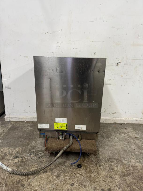 Lamber Deluxe high-temp undercounter dishwasher, stainless steel, 30 racks/hr. Visible wires, labels, used condition.