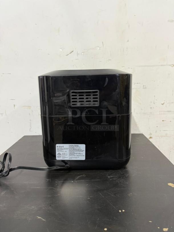Instant Pot Vortex Plus 10 air fryer toaster oven combo, black/stainless steel, 1500W, power cord visible, excellent condition.