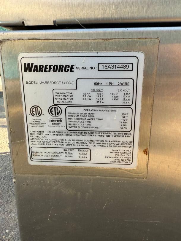 Wareforce UH30-E undercounter dishwasher with label showing model, serial number, specs, and energy efficiency details.