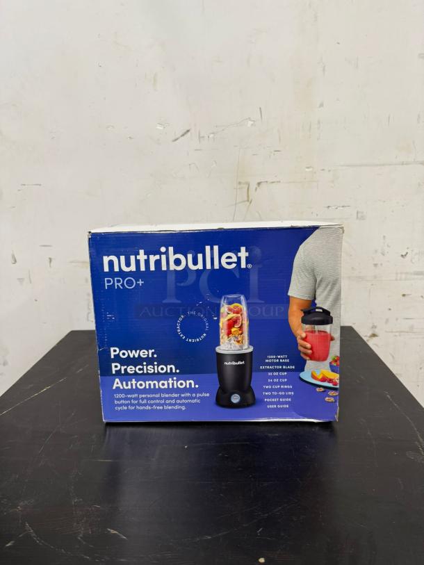 NutriBullet Pro Plus 1200W Personal Blender in box, Matte Black, Model N12-1001. Features include pulse function.