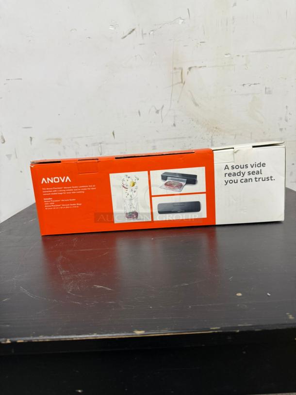 Anova Precision Pro Vacuum Sealer in box, new condition. Black model for sous vide cooking, features airtight seal.