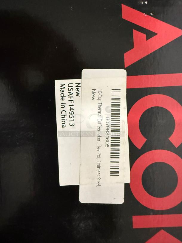 New AICOK Coffee Maker CM4682-V box with labels displaying model details and made-in-China origin.