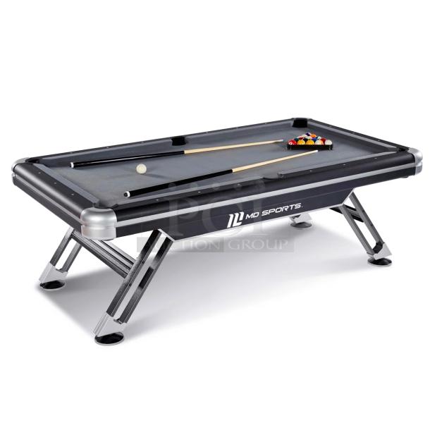 Brand new MD Sports Titan 7.4' billiard pool table, black finish, includes cues and balls, sturdy metal legs, logo visible.