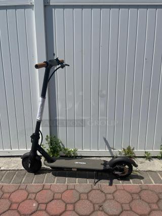 Jetson electric scooter with Bluetooth, foldable, hand-operated brakes, and headlights. Black frame, good condition.