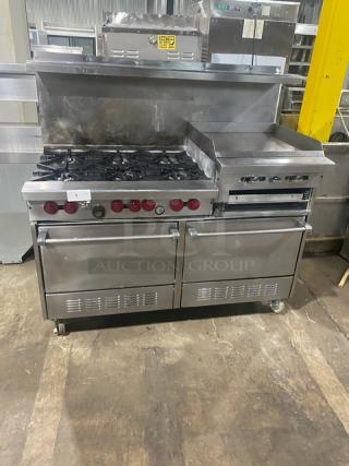 Garland stainless steel gas range with 6 burners, griddle, dual ovens, broiler, backsplash, salamander shelf, and casters, model H283.