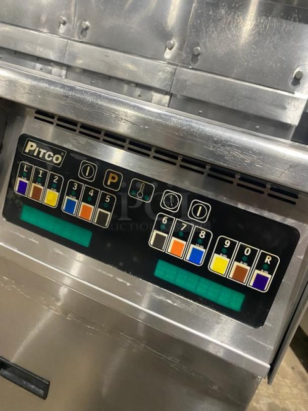 Pitco SSH60 commercial stainless steel triple bay deep fat fryer, natural gas, with backsplash, basket hanger, on casters.
