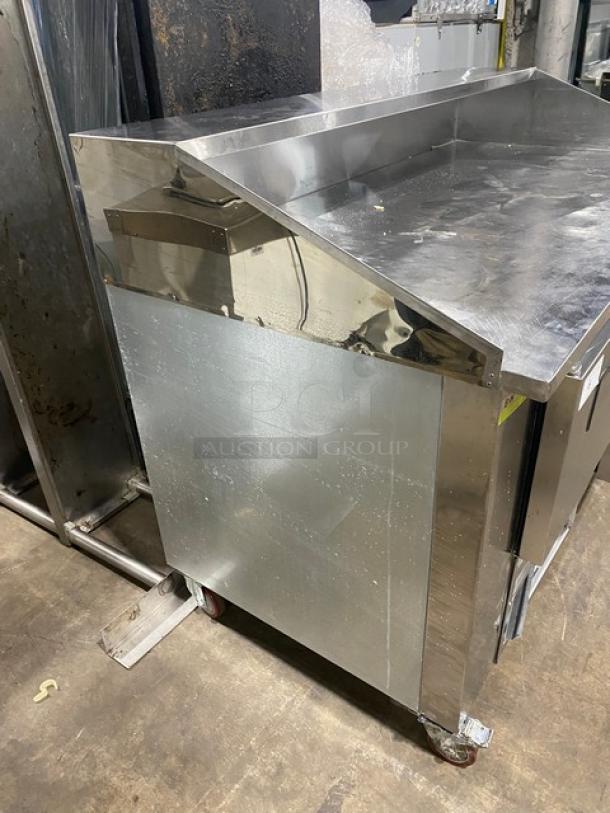 Cooltech 2022 stainless steel 2-door pizza prep table, model CTR-60DR, on casters, includes dough retarder feature.
