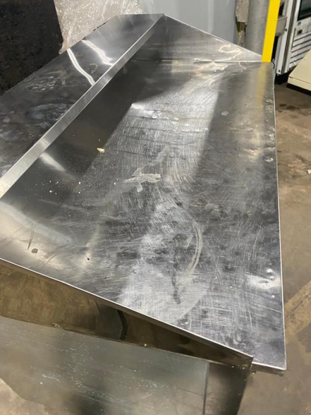 Cooltech 2022 stainless steel 2-door pizza prep table, Model CTR-60DR, on casters, minor surface wear visible.