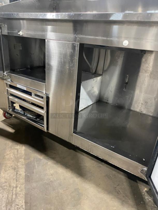 Stainless steel 2-door pizza prep table by Cooltech, model CTR-60DR, on casters, 115V, 1 phase, excellent used condition.