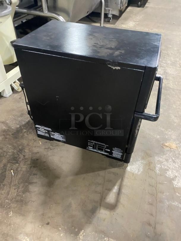MerryChef black electric countertop rapid cook oven, 208/240V, late model, in used condition with visible wear.