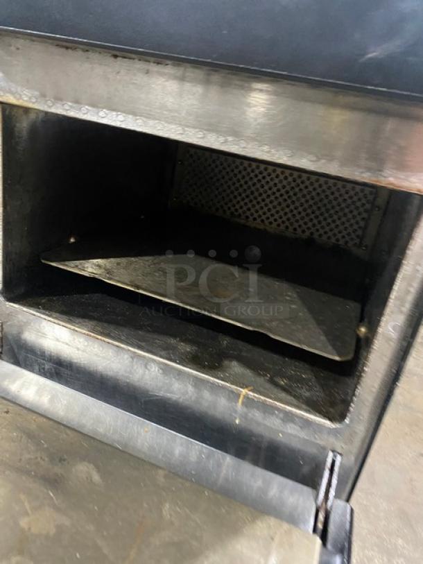 MerryChef late model commercial rapid cook oven, black, electric, 208/240V, countertop, visible interior, minor wear.