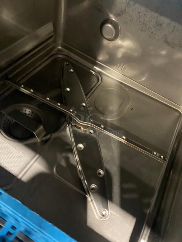 Hobart LXEC commercial under-counter dishwasher interior, showing stainless steel build and full-size peg rack. 120V, 1 phase.