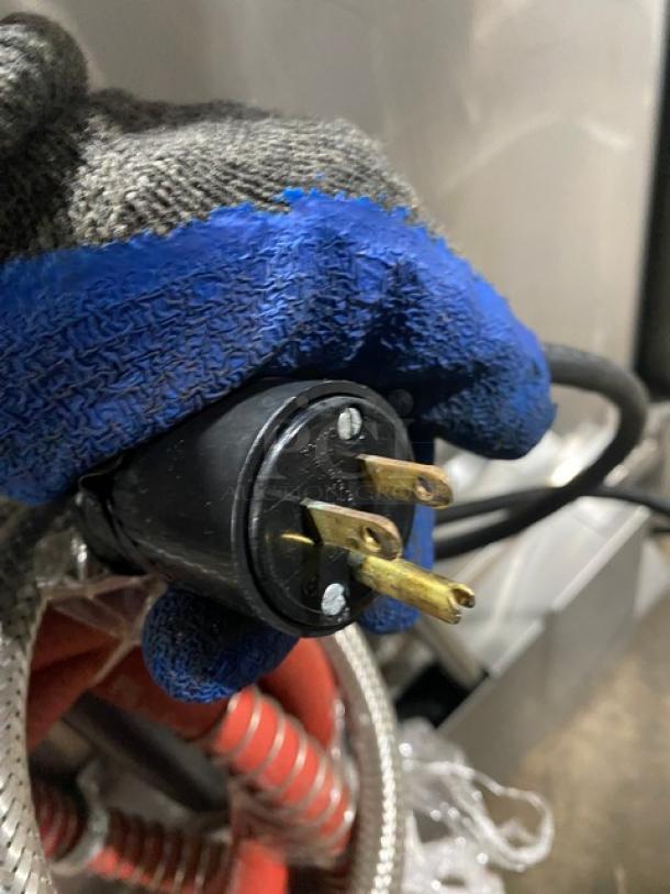 Alt text: Hobart LXEC commercial dishwasher plug close-up, showing a three-prong electrical connector.