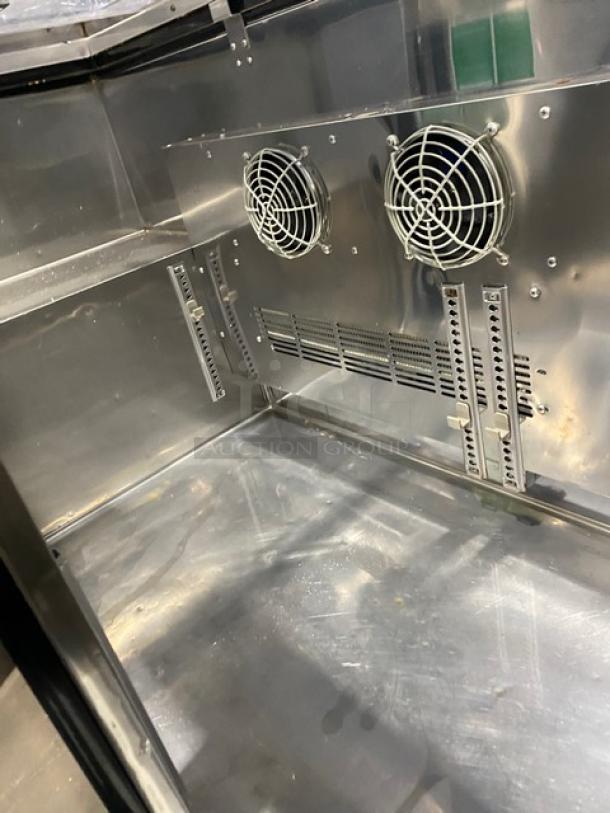 Turbo-Air JBT60 refrigerated buffet table interior with stainless steel finish, dual fans, and ventilation grilles.